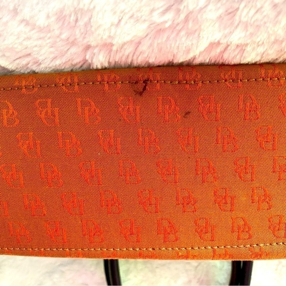 GENTLY used dooney bourke handbag orange. - Picture 4 of 7